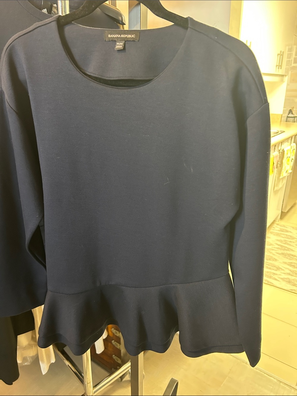 Banana Republic navy peplum thick lycra peplum top.